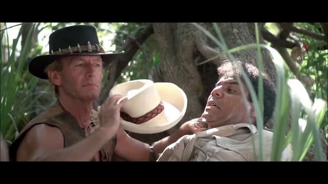 Crocodile Dundee ll (1988) Mick Dundee very tightly ties up Frank & Garcia & makes phone call. (HD)