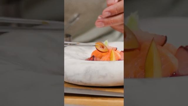 King Salmon Crudo with Plum Ponzu, Asian Pears, Shiso Oil, Miso,and fresh herbs by Chef Mark Rivera