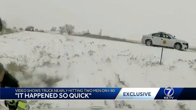 'It happened so quick': Video shows truck nearly hitting two men on I-80