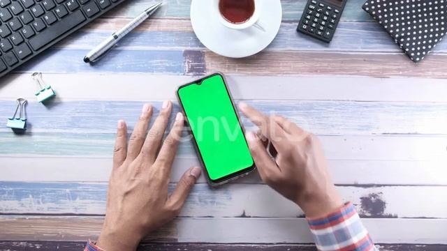 Businessman Using Smart Phone with Green Screen, Top View | Stock Footage - Envato elements
