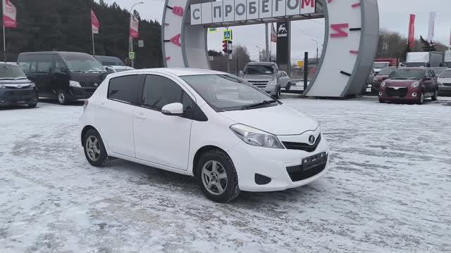 Toyota Vitz 1.0 CVT (69 л.с.) 2014