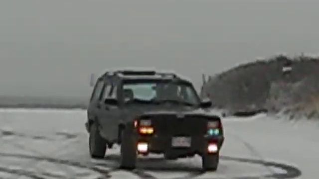 Jeep sliding in the snow 2