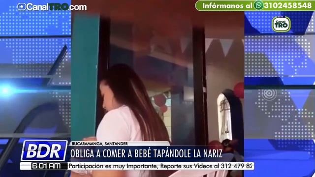 Mujer obliga a comer a bebé tampándole la nariz