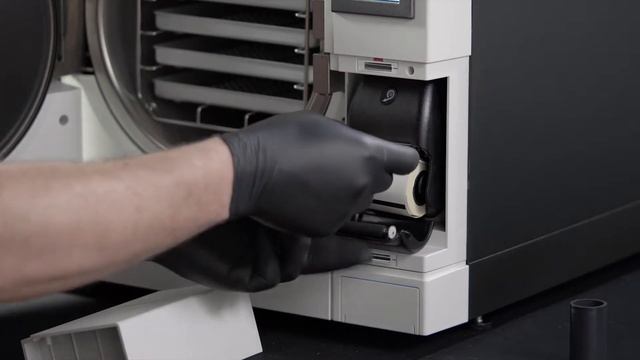 E10 Autoclave:Replacing the print set paper