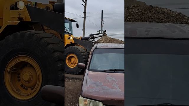 A forklift is driving on its way to work