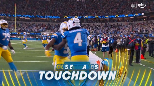 Gus Edwards easily finds space to walk in for a touchdown