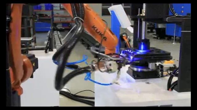 KUKA robot with laser welding machine.mp4