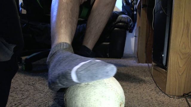 Skater with Grey socks and dc shoes smashes cantalope!
