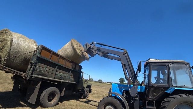 грузим рулоны на  мтз перевозка  на зилу и камазе