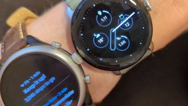 The Google Pixel Watch in action, next to  the Fossil Sport