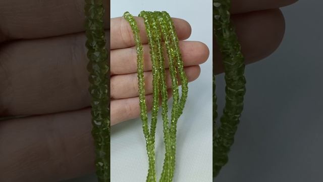 Бусины "Рондели" с огр Хризолит 2,2*4,2мм. Бусин в нити - 160шт. Цена - 6 220 ₽