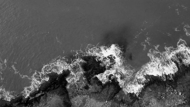 wave and rocks black & white