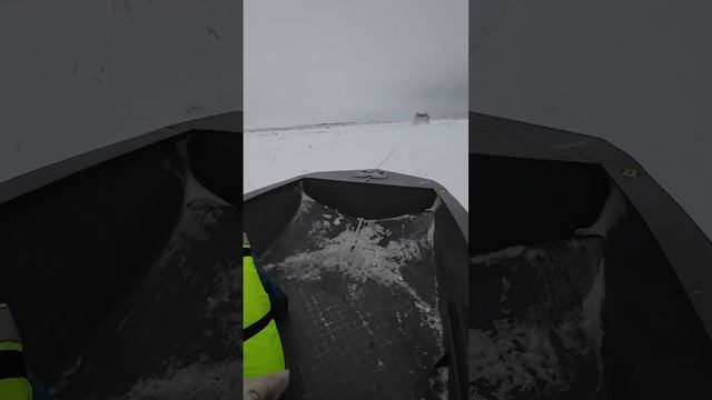 Зимой в поле на лодке