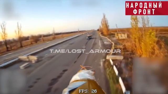 Оптоволоконный дрон ВС РФ ударил из засады по транспорту противника на трассе H-20 в ДНР.