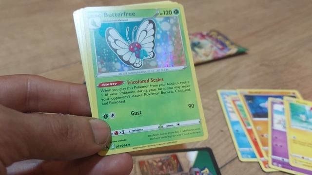 opening a pokemon vivid voltage booster pack