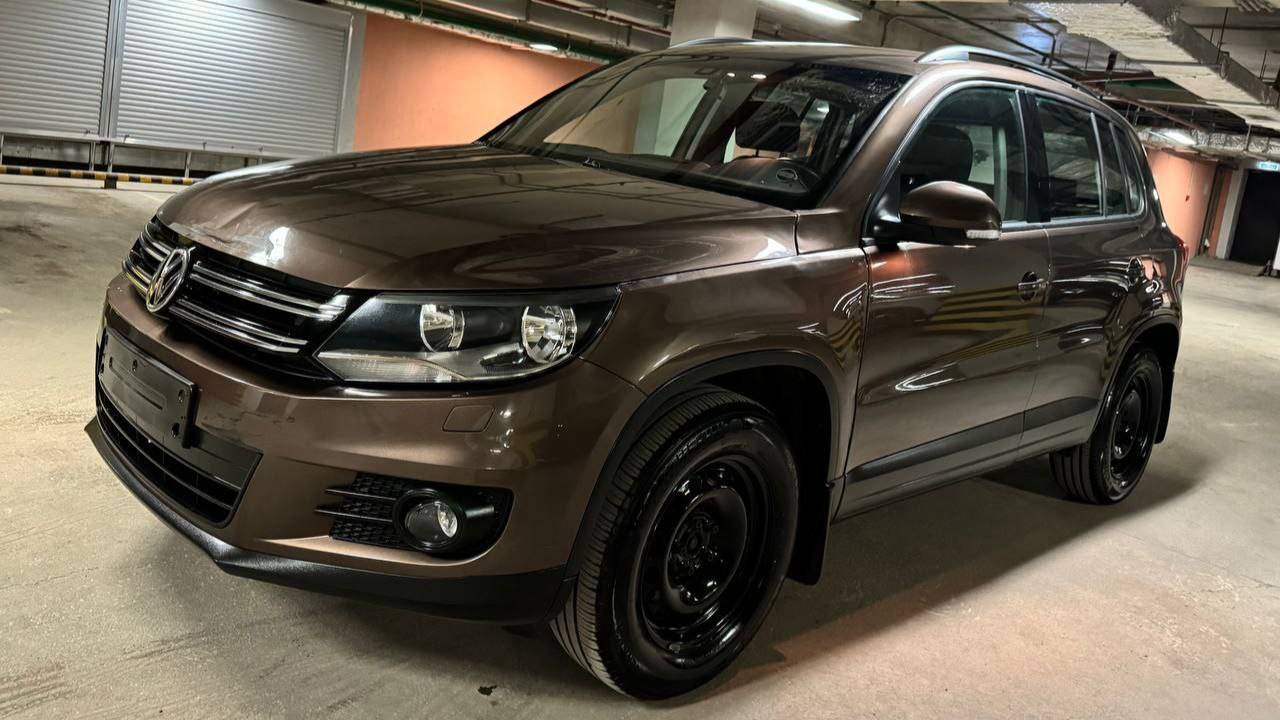 Volkswagen Tiguan; 1,4 AT; 2014; Коричневый