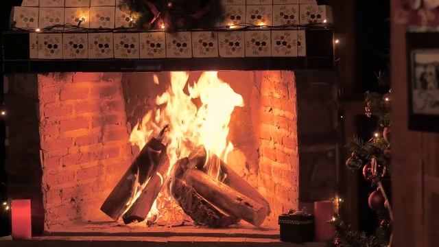 mixkit-a-fireplace-lit-at-christmas-time-2707-hd-ready.mp4