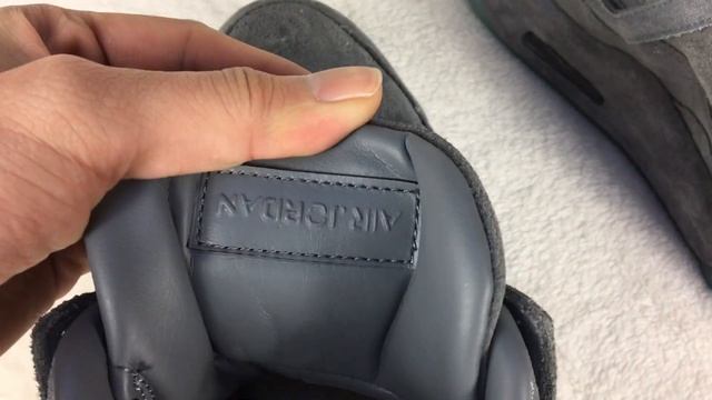 Authentic ”KAWS X Air Jordan 4 “Cool Grey” Review From Gobuykicks