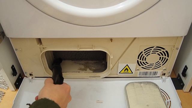 Candy Smart Pro clothes dryer • Cleaning heat exchanger