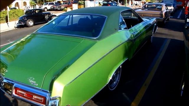I'm Looking at a gorgeous Riviera when a 1970 'cuda drove up