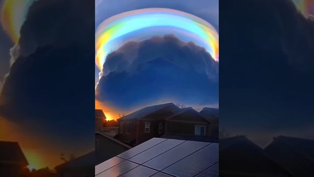 Rainbow colored scarf cloud over Haikou city in China