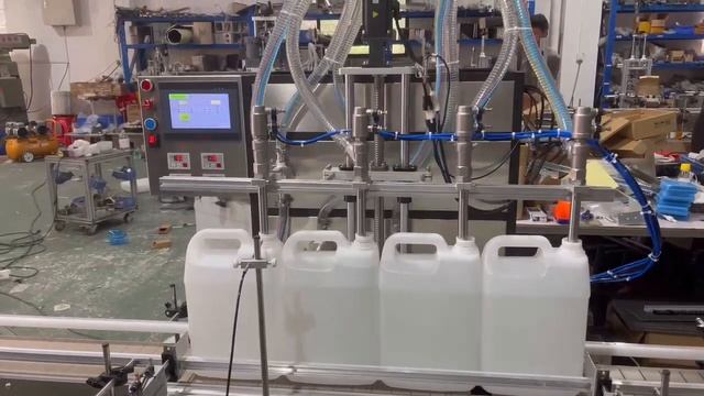 Автоматическая линия розлива сока, масла, химии в канистры, бутылки