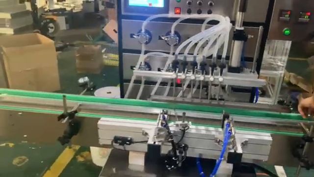 Автоматическая машина для розлива воскового масла