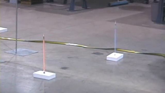 Tesla Coil Hitting Floor and Neon Tubes