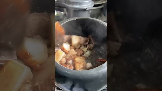 Masala pork prepared in pressure cooker with red rice