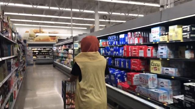 Buying all the hot dogs at Walmart In a hot dog suit