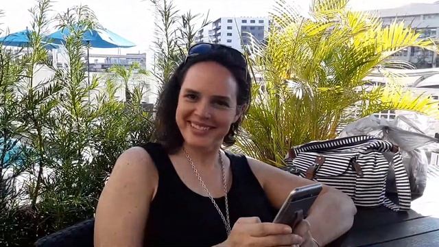 Having a mojito by the pool