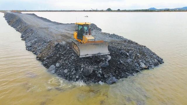 Строительство, очередная дорога через озеро