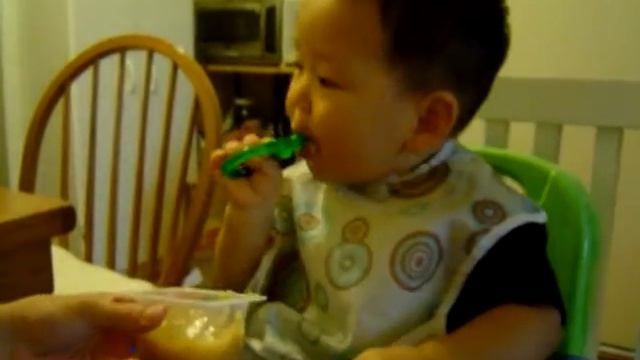 Ethan spoon feeding 9.3.08