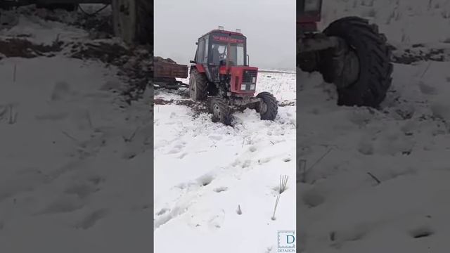 Белорус 82.1 буксует на поле