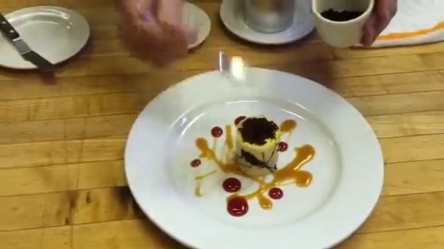 Pastry Chef Shawn Richard plates a Passionfruit Charlotte