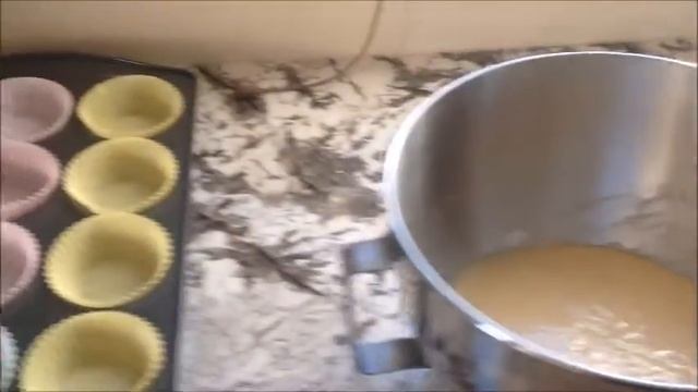 strawberry jam filled vanilla cupcakes with buttercream frosting