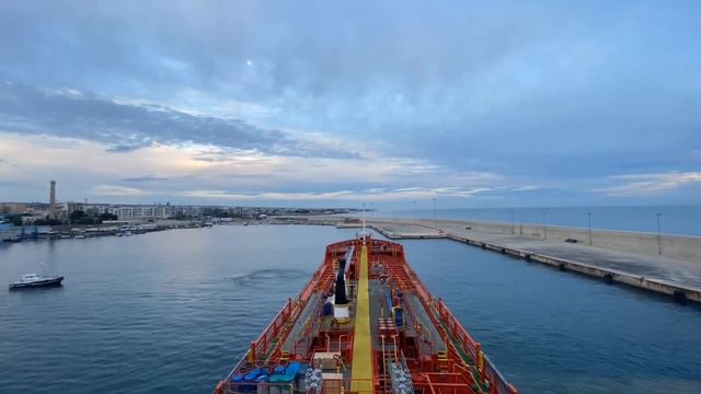 Monopoli, Italy. Vessel is entering to the port. Mooring operations.