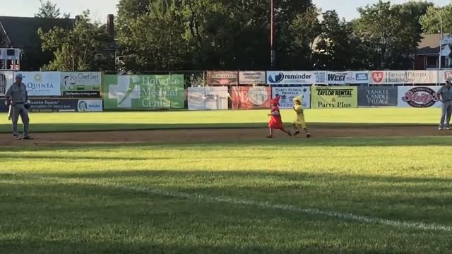 Connor (yellow) doing the Ketchup vs Mustard race at the Valley  Blue Sox (MA) July 2017