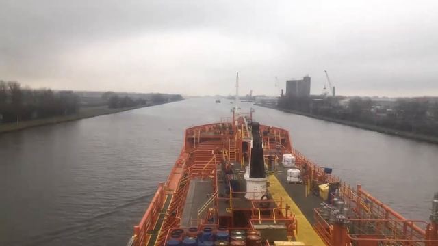 From Ghent to North Sea via lock timelapse. Vessel leaves port of Ghent Belgium.