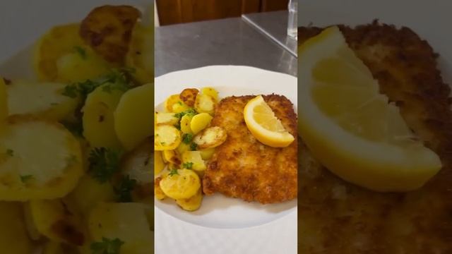 Chicken schnitzel with bake potatoes