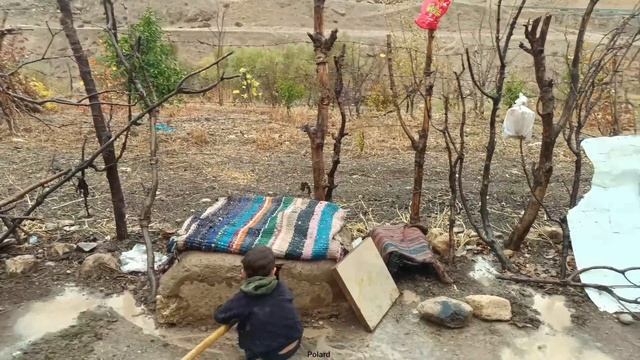 A rainy day in Zagros: nomadic life,traditional cooking and keeping goats warm