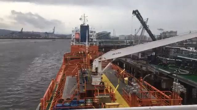 TeesPort (U.K.) - Unmooring vessel from berth. High water in progress.