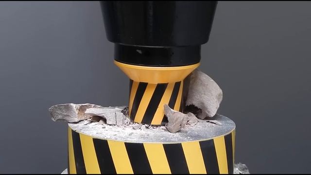 HYDRAULIC PRESS AGAINST TUNGSTEN AND GRANITE