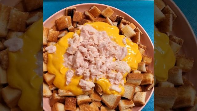 eat Chicken Chunks with Nacho Cheese Sauce and Toast Bread Squares