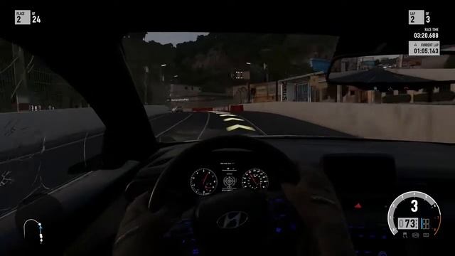 Forza Motorsport 7 gameplay with steering wheel and pedals.