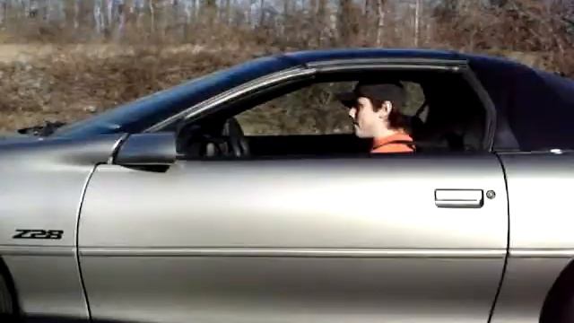 02 Z28 WITH LID AND CATBACK VS STOCK 07 BMW M5.