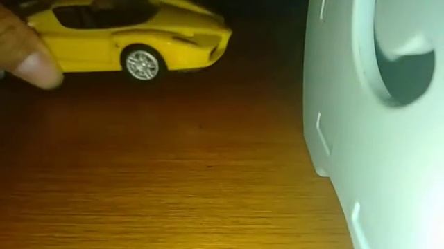 Enzo Ferrari yellow diecast