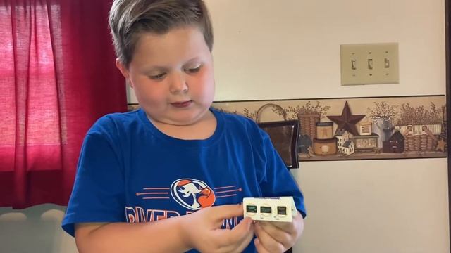 Declan opens Mini Brands Series 3 Advent Calendar