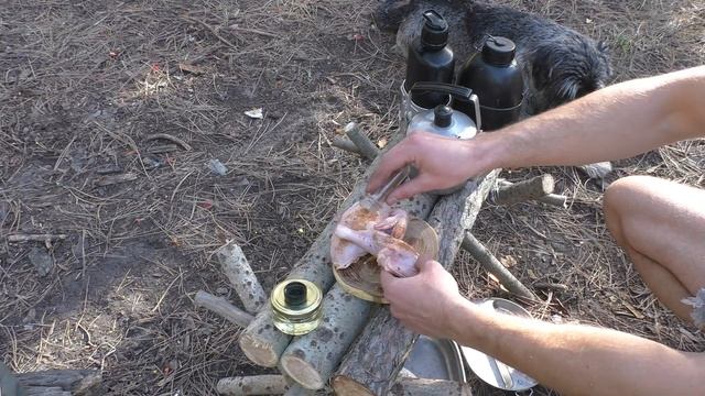 Outdoor with Schnauzer. Forest Furniture. Bushcraft Table. Finnish candle.