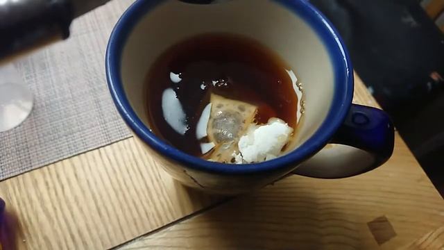 Slow mo sugar dissolving into tea    (with sound) 🔊